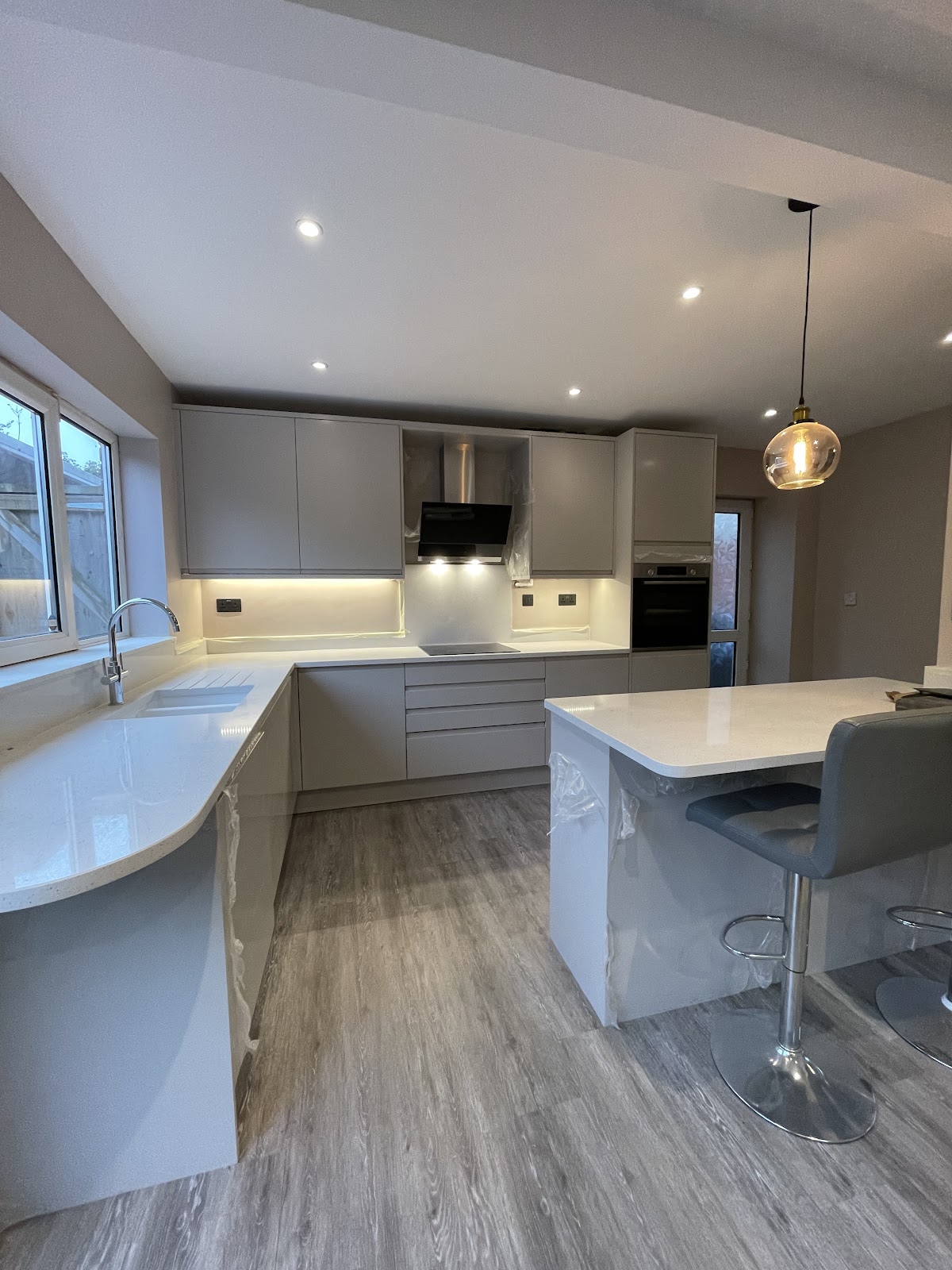 A finished modern kitchen fitted and lit by JB Home & Electrical Services