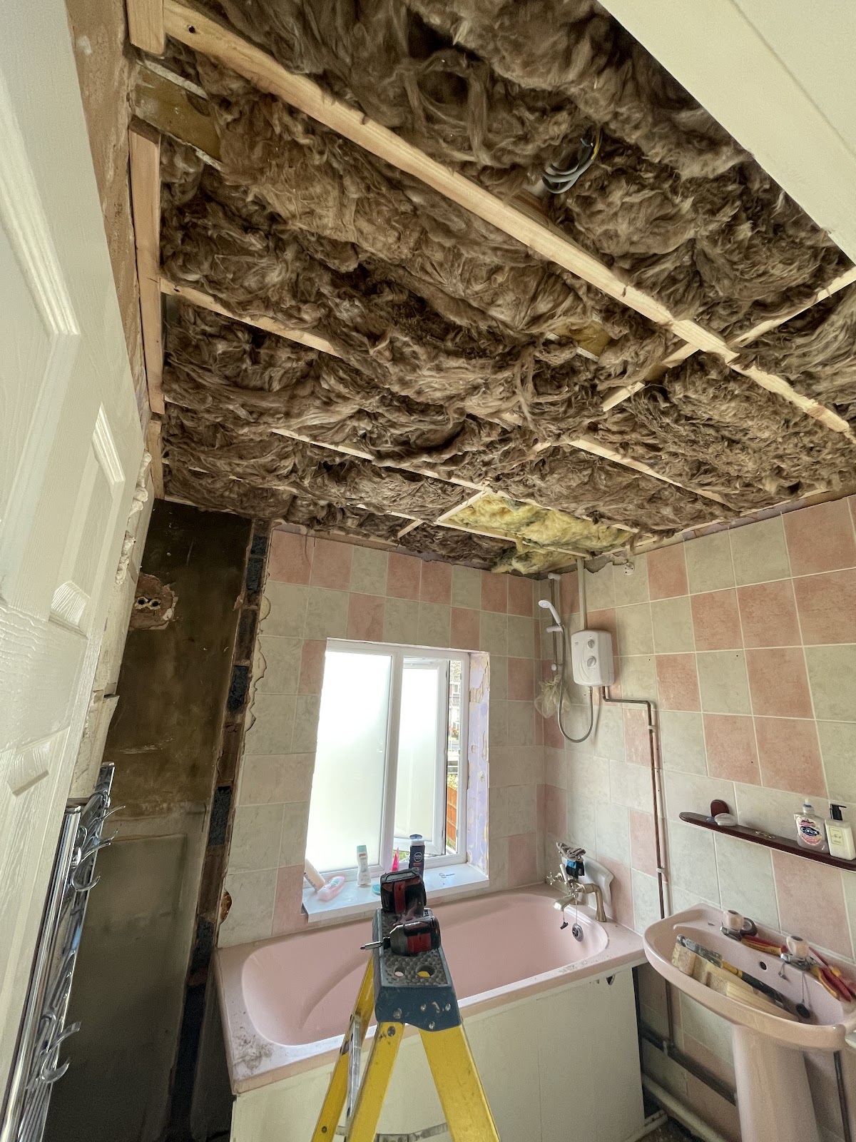 Bathroom mid-renovation during a full strip-out